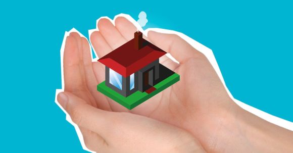Debt Estate Planning - Cutout paper composition with house in handful showing concept of buying private apartment against blue background