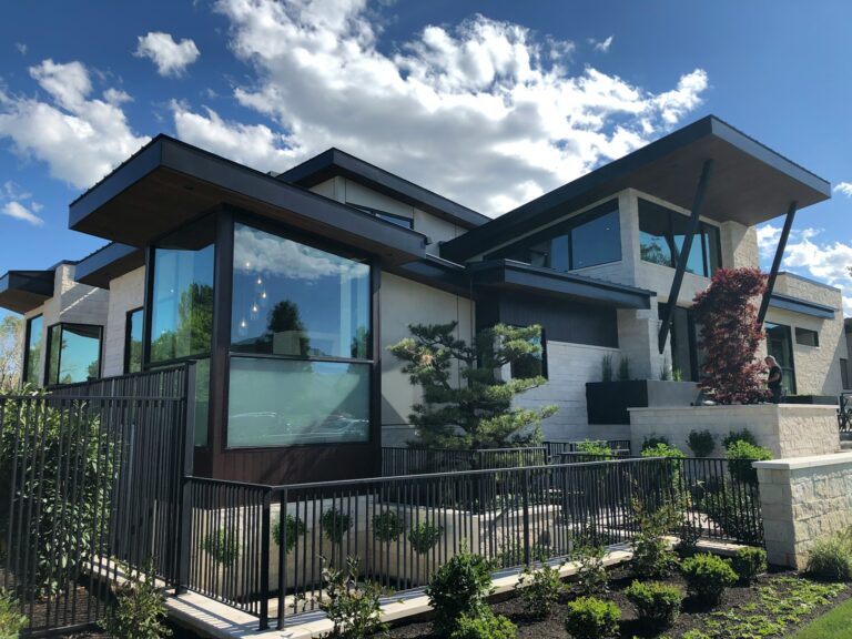 white-and-brown-wooden-house-under-blue-sky-during-daytime